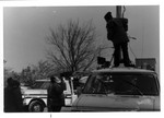 Television crew setting up for a live shot.